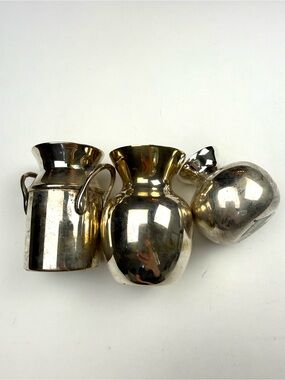 Two’s Company silver bud vases and candle holder